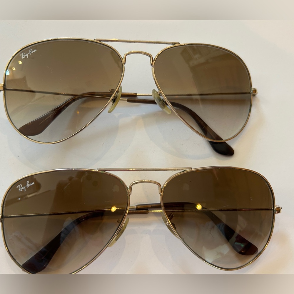 Ray-Ban Aviator sunglasses. The darker pair are available. The lighter ones sold
